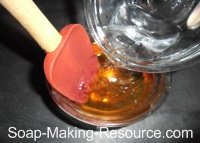 Pouring Water into Honey for Dilution