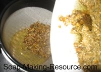 Straining Chamomile Flowers from Olive Oil